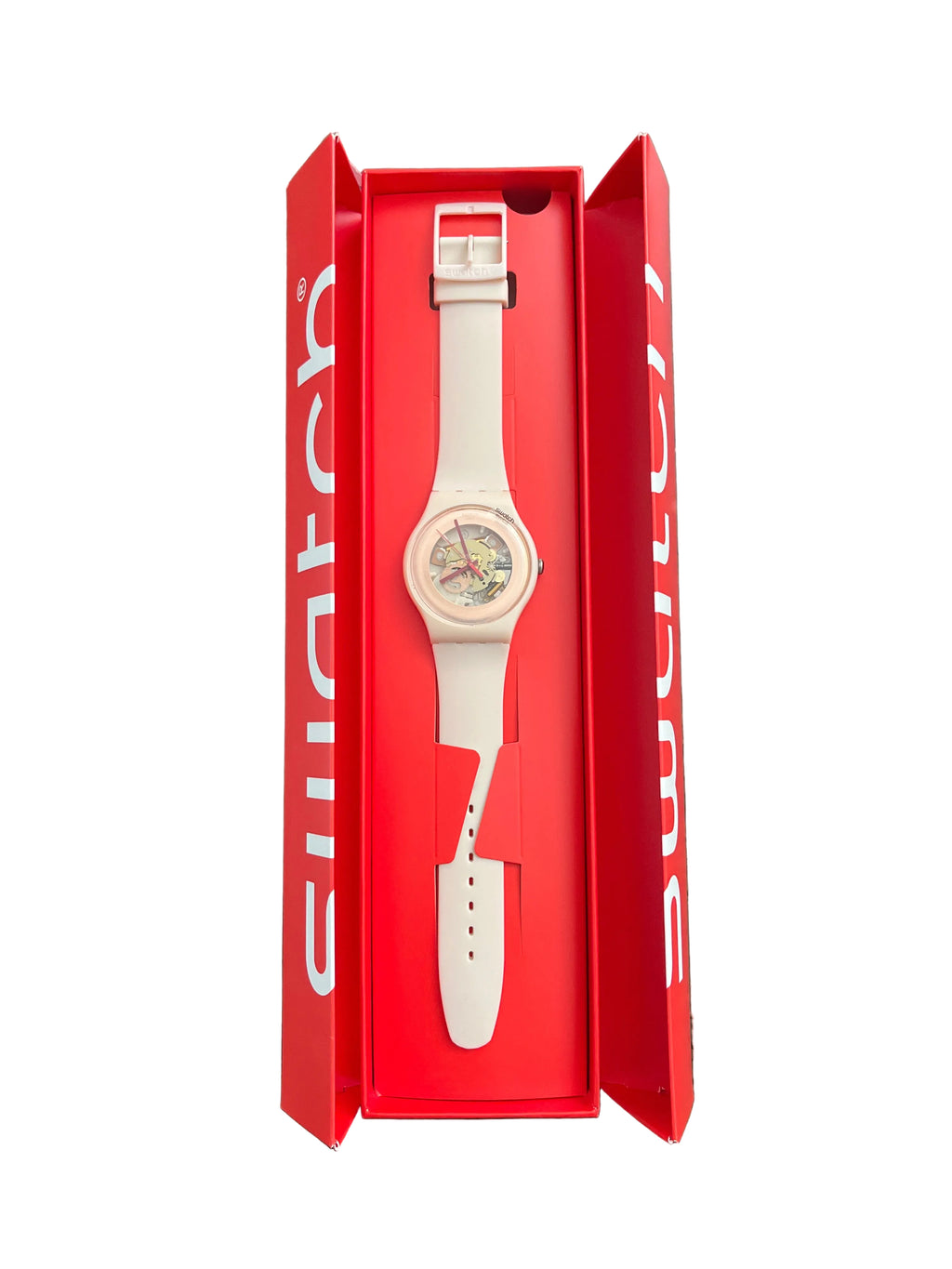Blush see-through Swatch watch in box