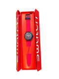 Swatch watch with navy orbit dial and pink strap