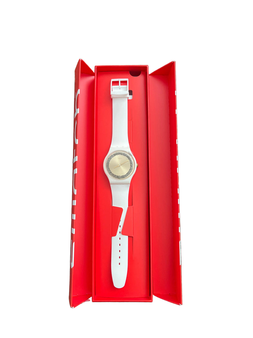 White Swatch watch with gold glitter dial