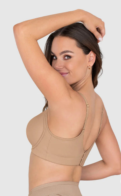 Bra with good coverage in neckline and back 
Maxi Support Bra 
Or more natural: 
Full Coverage Bra with Max Support 091086