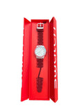 White Swatch chronograph with red and blue bezel and burgundy strap